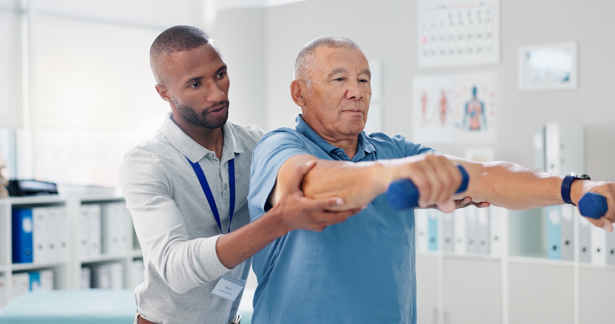 Dumbbells, physical therapy and old man with physiotherapist, muscle training and strength with sen